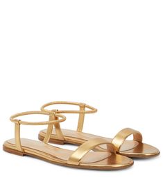 The Jaime sandals from Gianvito Rossi are a glamorous option for the everyday. Covered in golden metallic leather, this pair features low, stacked heels and elasticated ankles that remind of hair ties. | Gianvito Rossi Jaime flat metallic leather sandals Rose Gold Accessories, Designer Flats, Shades Of Gold, Gold Sandals, Bari, Metallic Leather, Max Mara, Gianvito Rossi, Hair Ties