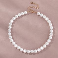 Be adorned in timeless sophistication with this exquisite pearl chain necklace. Carefully crafted from pearls, this elegant piece will be a timeless addition to your accessory collection. The subtle and classic luster of this fine necklace is perfect for any special occasion, making it the ideal accessory for any look. Order Now for FREE Shipping Specifications Style: Classic Shape/pattern: Round Pearl Type: Simulated-pearl Pearl Shape: Perfectly Round Occasion: Party Necklace Type: Chokers Neck Glamour Jewelry, Pearl Chain Necklace, Pearl Necklace Wedding, Party Necklace, Neck Jewellery, Pearl Choker Necklace, Chain Choker Necklace, Necklace Fashion, Pearl Choker