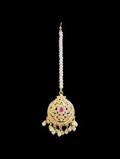 Gold plated jhoomar tika Jhoomar is 6 inch long 4 inch wide Tika is 1.6 inch height made using shell pearls with zircon gold plated Silver Jewelry Earrings, Silver Jewelry Pendant, Jewelry Design Necklace, Pendant Set, Bridal Sets, Pendant Jewelry, Necklace Set, Jewelry Stores, Anklets