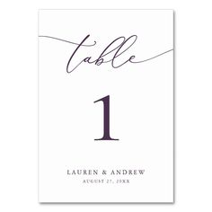 a table number card with the word table 1 in cursive writing on it