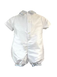 Sophisticated Shantung Fabric: Crafted from high-quality shantung fabric, this romper exudes sophistication and elegance, ensuring your child looks charming and stylish. Blue Detailing: The blue accents add a touch of color and charm to the romper, creating a beautiful contrast against the shantung fabric. Short Sleeve Design: The short sleeves provide a comfortable fit and allow for easy movement, making it ideal for active toddlers. Matching Barret: Complete the look with the matching barret, adding an extra touch of style and elegance to your little one's outfit. Versatile Style: Whether it's a christening, wedding, or any special event, this romper is versatile enough to suit various occasions, making it a timeless addition to your child's wardrobe. Attention to Detail: Meticulously cr Blue Accents, Versatile Style, Sleeve Designs, Special Event, Comfort Fit, Rompers, Short Sleeves, Wardrobe, High Quality