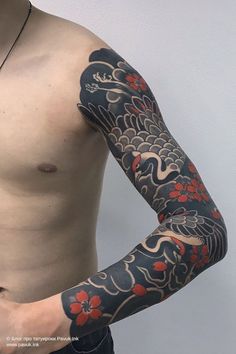 a man with a tattoo on his arm