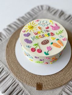 a decorated cake sitting on top of a white plate