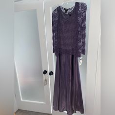 Brand New With Tags Gown And Cover Up. Was Not Worn For Mother Of The Bride As She Thought She Would. Dress Is A Size 8 And The Cover Up Is A Size 10. Just Trying To Get Some Money Back On It. Was On Sale And Spent $100 As Shown In The Picture. Fitted Lavender Floor-length Maxi Dress, Lavender Fitted Floor-length Maxi Dress, Fitted Lavender Maxi Dress For Evening, Fitted Lavender Maxi Dress For Formal Occasions, Lavender Fitted Maxi Dress For Formal Occasions, Lavender Fitted Maxi Dress For Evening, Elegant Lavender Maxi Dress For Evening, Formal Lavender Floor-length Dress, Lavender Floor-length Formal Dress