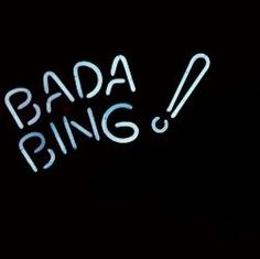 a neon sign that says bada bing