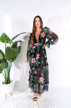 "Product Details: 💫 Long sleeve with a deep v-neckline 💫 Backless with ruffle detail  💫 Belt attach  💫 Front Side Pockets 💫 Allover floral print 💫 Backless invisible zipper & back self-tie   💫 Fulled Lined 💫 True Size 💫 Lightweight fabric 💫 Made in Europe 💫 Model measurements: 5'10\" height, 34\" bust, 24\" waist, 37\" hips, wearing a size small 💫 This item is part of our 100% I TOOS EXCLUSIVE collection, featuring exclusive pieces you won't find anywhere else. 🔔Need Additional Info Printed V-neck Maxi Dress For Date Night, Black V-neck Dress With Rose Print, Spring V-neck Maxi Dress With Rose Print, Hand Band, Open Stitch Sweater, Ruched Sleeve Blazer, Anne Hathaway, Womens Size Chart, Relaxed Style