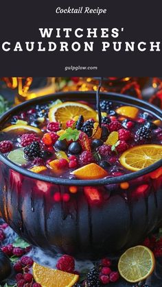 witches cauldron punch recipe with oranges, raspberries and blackberries