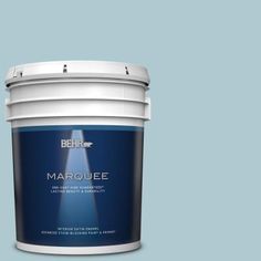 a bucket of marquee paint on a white background