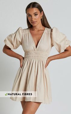 Get ready to turn heads in the Francesca V Neck Puff Sleeves Mini Dress! This neutral, A Line dress is made from 100% cotton for a comfortable and breathable fit. The flattering V neck adds a touch of elegance, while the puff sleeves add a playful and feminine twist. Perfect for any casual occasion, this mini dress is your go-to choice when you want to feel effortlessly stylish. Pair it with your favorite accessories and get ready to slay the fashion game!Product Details:A-line dress silhouetteM Cotton Puff Sleeve Dress For Brunch With Gathered Sleeves, Cotton Puff Sleeve Dress With Gathered Sleeves For Brunch, Cotton Mini Dress With Puff Gathered Sleeves, Chic Cotton Puff Sleeve Dress, Cotton Ruched Puff Sleeve Dress For Brunch, Cotton Puff Sleeve Mini Dress For Day Out, Cotton Puff Sleeve Ruched Dress For Day Out, Cotton Puff Sleeve Dress For Day Out, Knee-length Cotton Puff Sleeve Dress With Ruched Detail