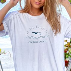 Cousins Beach Retro Beach T-Shirt, Cousins Beach Massachusetts, The Summer I Turned Pretty Inspired T-Shirt, TSITP Shirt This soft-style tee is perfect for any The Summer I Turned Pretty lover!  RETURNS OR EXCHANGES All of our items are printed as soon as you place your order, therefore we do not accept returns or exchanges.  If there are any issues with your item, please message us and we will work to find a solution. MATERIAL AND WASHING INSTRUCTIONS - 100% Cotton - Light and Soft fabric - Loose fit - Runs true to size - Wash inside out in cold water, on a gentle cycle.  - Air dry - Do not use fabric softener or bleach - Do not iron directly on the design White Graphic Print T-shirt For Vacation, White Text Print Top For Vacation, White Text Print Tops For Beach, White Printed T-shirt For The Beach, White Short Sleeve T-shirt For Beach Party, Summer White Print Short Sleeve Top, White Print Short Sleeve Tops For Beach Season, White Print Short Sleeve Summer Top, Casual White Print Tops For Vacation