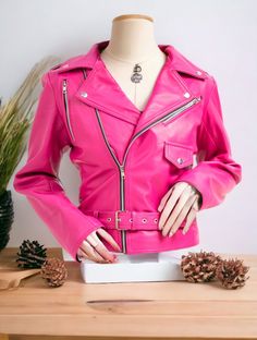 Women Slim Fit Pink Leather Jacket | Women's Biker Motorcycle Jacket | Women 100% Lambskin Pink Motorcycle Leather Jacket, Pink Party Jacket Discover the epitome of style and sophistication with our Women's Slim Fit Pink Leather Jacket collection. Crafted from 100% lambskin leather, these biker motorcycle jackets blend fashion with functionality seamlessly. Perfect for adding a bold statement to your ensemble, whether it's a casual day out or a vibrant party night. Embrace your individuality and Punk Style Pink Long Sleeve Outerwear, Trendy Long Sleeve Leather Jacket For Biker Events, Pink Winter Biker Jacket For Party, Pink Punk Biker Jacket For Winter, Pink Punk Biker Jacket With Long Sleeves, Pink Punk Winter Outerwear, Pink Punk Outerwear For Spring, Pink Winter Party Biker Jacket, Pink Biker Outerwear With Zipper Closure