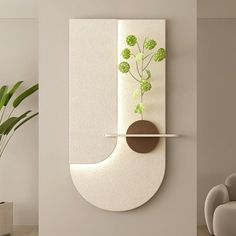 a modern living room with white furniture and green plants on the wall hanging from it's side