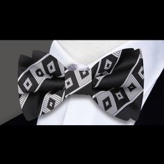 Silver and Black Scope Bow Tie Modern Black Suit And Tie Accessories For Formal Occasions, Dapper Black Tuxedo For Business, Dapper Black Business Tuxedo, Elegant Black Bow Tie For Business, Dapper Black Suit And Tie Accessories With Decorative Bow, Black Tuxedo With Bow Tie For Black Tie Occasion, Black Tuxedo With Bow Tie For Black Tie Events, Black Dapper Suit And Tie Accessories With Bow, Black Tuxedo For Black Tie Events With Bow Tie