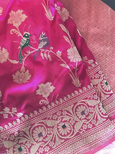 This pure katan silk banarasi saree is an epitome of beauty!. It is just too exquisite. Kudos to the craftsmanship of the weaver! This fuschia pink katan silk banarasi saree is woven in a fine kadwa weave. Saree has floral jaal motifs with meenakari motifs including bird motifs. Pallu and borders have kadwa meenakari floral motifs.  Kadhua/kadwa technique is a laborious process with each motif woven separately and takes both time and high level of skill. This is a saree that can be passed on to Rani Pink Banarasi Saree, Chunni Designs, Pink Banarasi Saree, Banarasi Fabric, Katan Saree, Silk Banarasi Saree, Banaras Sarees, Banarsi Saree, Floral Saree