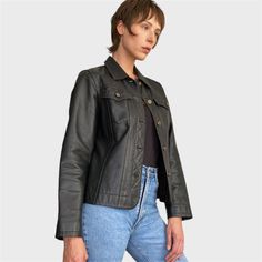 This 90s vintage black leather jacket is a timeless piece that exudes retro style and sophistication. Crafted from high-quality leather, this jacket features a classic button closure and is designed in a versatile size M/L. With its sleek silhouette and timeless design, this leather blazer is the perfect addition to any wardrobe, adding a touch of edgy elegance to any outfit.  CONDITION: Great Vintage Condition FABRIC: genuine leather SIZE: UK 12/L, EU 40/L , will fit other sizes depending on de Classic Button-up Leather Jacket With Pockets, Fall Leather Biker Jacket With Buttons, Classic Black Biker Jacket With Button Closure, Black Casual Leather Jacket With Snap Buttons, Casual Black Leather Jacket With Snap Buttons, Classic Leather Jacket With Button Closure, Classic Black Leather Jacket With Button Closure, Classic Winter Biker Jacket With Buttons, Fall Biker Leather Jacket With Button Closure