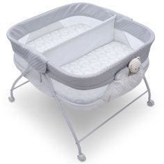 a baby crib with wheels on it