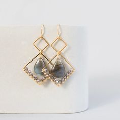 Handmade with smooth "flash" labradorite gemstones for guaranteed sparkle!Free shipping on our modern gemstone earrings. Great wedding earrings or bridesmaid earrings. A perfect gift idea for her, gift for mom or best friend gift.- 1.75" long- French hooks- 14k gold plated fine Italian silver- Arrives in a gift boxOur unique plating technique makes our gold plated jewelry tarnish resistant.All of our earrings and necklaces are made in the USA in our New York City studio.The unique nature of real Elegant Nickel-free Labradorite Earrings, Elegant Labradorite Drop Earrings, Elegant Labradorite Teardrop Earrings, Elegant Labradorite Dangle Earrings, Elegant Teardrop Labradorite Earrings, Stacked Beaded Bracelets, Beaded Earrings Diy, Unique Nature, Upcycled Jewelry