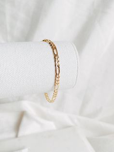 Are you looking for the perfect everyday accessory? Look no further than the Figaro Bracelet! This simple yet stylish gold filled figaro link bracelet is perfect for any outfit, and it's custom fit to your wrist for the ultimate wearing experience. ∙ D E T A I L S ∙ - 18k Gold Filled 4mm Figaro Chain - Base Meal : Copper - Lead + Nickel Free ∙ G O L D ∙ F I L L E D ∙ Gold-filled components contain 100+ times more real gold than gold-plated components and are both durable and tarnish resistant. I Minimalist Hypoallergenic Gold-plated Bracelet, Elegant Gold-plated Paperclip Bracelet, Elegant Gold-plated Figaro Chain Bracelet, Minimalist 14k Gold-filled Yellow Gold Paperclip Bracelet, 14k Gold-filled Hypoallergenic Pearl Bracelet Gift, Figaro Bracelet, Gold Bracelet Simple, Wrist Accessories, Gold Chain Bracelet