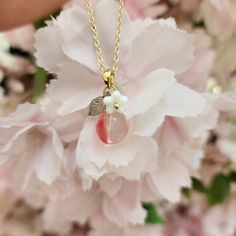 Material: Our glass peach necklaces are made with glass peaches, acrylic leaves, glass flowers, and 14K gold plated chain which is hypoallergenic.Size: the pendant is about 0.6" wide and 1" long the chain is 18" long with 1.25" extender Pink Flower Charm Necklace With Flower Pendant, Delicate Peach Jewelry For Gifts, Pink Flower Glass Jewelry, Pink Flower-shaped Glass Jewelry, Peach Flower Shaped Jewelry For Gift, Peach Flower-shaped Jewelry For Gift, Pink Dainty Necklace With Birth Flower, Peach Food, Acrylic Leaves