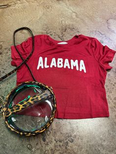 red alabama crimson tide t-shirt Collegiate Tops With Letter Embroidery For Game Day, Varsity Style Top With Embroidered Graphics For Fan Gear, Casual Letter Print T-shirt For Tailgating, Collegiate Letter Embroidery Top For Game Day, Cotton Tops With Embroidered Graphics For Fan Gear, Team-colored Tops With Embroidered Graphics For Fans, Collegiate Summer Fan Gear Tops, Collegiate Tops With Embroidered Graphics For Game Day, Varsity Tops With Embroidered Graphics For Game Day