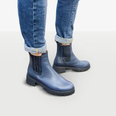 "This Chelsea boot offer an elegant combination of classic navy blue and edgy croc-embossed leather. It features elongated shaft, elasticated side panels and tractor sole. As a bonus, there is a pull tab at the back for an easy wear. Outer and inner material - leather, manmade sole, closure - slip on. Shaft height 14 cm / 5.5\", heel - 4.5 cm / 1.8\" --------Size Conversion & Feet Measurements------ EU 34 US 4.0 UK 1.0 | 22.5 cm / 8.85\" EU 35 US 5.0 UK 2.0 | 23.0 cm / 9.05\" EU 36 US 6.0 UK Casual Blue Leather Waterproof Boots, Blue Leather Boots With Vibram Sole, Navy Round Toe Boots For Winter, Blue Leather Moto Boots For Fall, Navy Leather Boots For Outdoor, Blue Winter Boots With Rubber Sole, Winter Blue Boots With Rubber Sole, Blue Ankle-high Boots With Rubber Sole, Blue Boots With Rubber Sole