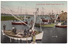 an old postcard shows several boats in the water and people standing on top of them