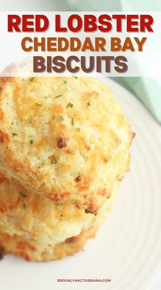 two red lobster cheddar bay biscuits on a white plate with text overlay