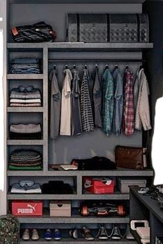 an organized closet is shown with clothes and shoes on the shelves, along with other items