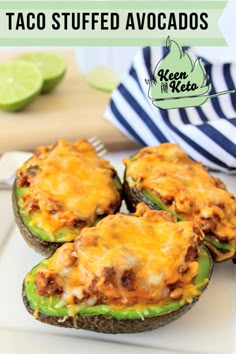 three stuffed avocados sitting on top of a white plate