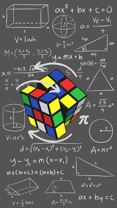 an image of a rube cube in the middle of some calculations on a blackboard