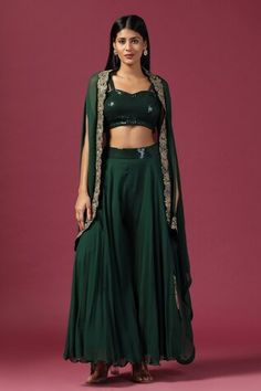 Bottle green cape with thread embroidery in floral pattern on placket. Paired with sequin embroidered crop top and palazzo. - Aza Fashions Designer Fitted Green Outerwear, Fitted Cape Set With Dupatta, Green Cape, Green Thread, Embroidered Crop Tops, Palazzo Set, Thread Embroidery, Two Sisters, Bottle Green