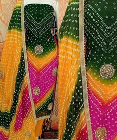 Welcome to Craftexo Fashion We are providing best quality of dress material for Indian Ethnic Women wear. FABRIC ;DETAILS TOP:  Jaipuri Silk with hand work (2.5mtr appx) Bottom: Shantoon 2.5 mtrs (approx) Dupatta: Jaipuri silk Bandhani hand work dupatta Note: These are not running fabrics so if your bust/hip size is more than 54 inches or you want dress style other than salwar kameez suit/ pant palazzo suit please contact us for desired dress style before order placement. COLOR:( As shown in the image, may vary due to lightning, flash light while photo shoot and according to screen settings and resolution ) Multicolor Anarkali Salwar Kameez With Traditional Drape, Multicolor Anarkali Churidar With Traditional Drape, Multicolor Anarkali Kurta With Traditional Drape, Designer Multicolor Anarkali Set With Zari Work, Multicolor Anarkali Set With Gota Work, Anarkali Kurta With Dupatta In Multicolor, Bollywood Style Multicolor Straight Kurta Anarkali Set, Multicolor Bollywood Anarkali Set With Straight Kurta, Bollywood Style Multicolor Anarkali Set With Straight Kurta