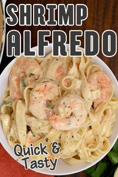 A serving of a serving of shrimp alfredo pasta.