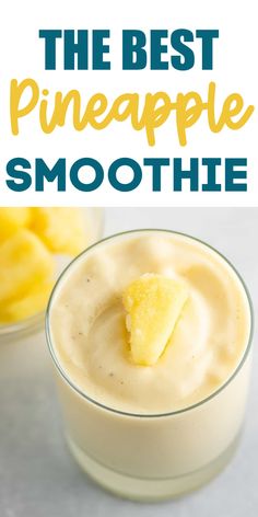 a pineapple smoothie is garnished with a bite taken out of it