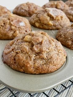 freshly baked muffins sitting on a cooling rack