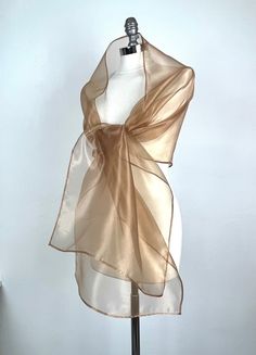 A very elegant and luxury shawl for your wedding dress made of the finest organza Color: cinnamon / bronze (other colors are available) Size: 200 cm x 46 cm (approx.) You can wear it on your shoulders or you can use any brosche to close it. Elegant Gold Shawl For Gift, Elegant Gold Shawl Gift, Elegant Gold Silk Shawl, Luxury Shawl, Organza Shawl, Formal Wrap, Gingerbread Coffee, Evening Dress Wedding, Bronze Dress