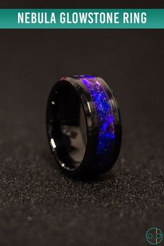 The nebula ring features a blue and purple glowstone inlay with amethyst and tiny uncut diamonds. #glow #glowring #amethyst #diamonds #weddingring #engagementring #patrickadairdesigns Purple Ring Men, Black And Purple Ring Men, Luxury Men's Amethyst Ring With Polished Finish, Luxury Hallmarked Men's Amethyst Ring, Nebula Ring, Glow In The Dark Mens Ring, Glow Ring, Ceramic Ring, Mens Rings