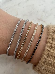 Shine all day in this modern and trendy take on our classic tennis bracelet. Available in 14K Yellow Gold, 14K White Gold & 14K Rose Gold Diamonds are G/H SI Cttw: 0.50 All 14K items can be exchanged, no returns Rose Gold Black Diamond, Ring Stacks, Black Diamond Bracelet, Tennis Chain, Diamond Tennis Bracelet, Black Sapphire, Elegant Nails, Tennis Necklace, Black Diamonds