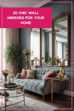 a living room with blue walls and pink accents, gold mirrors on the wall and a gray couch