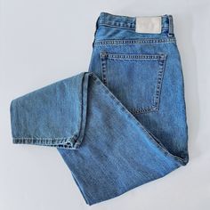 "High-waisted straight fit cropped ankle jeans with a booty boosting fit. Made by Everlane 100% Cotton Size: 31 Regular Measurements are taken lying flat. Waist: 17\" Hip: 21.5\" Rise: 12\" Inseam: 28\": Length: 39.5\" Please note: All sales are final and sold \"as is\".  You are purchasing a preloved item.  You will receive the exact piece that is pictured.  I will always try to mention all flaws as I see them." Mom Fit Cropped Jeans With Pockets For Everyday, Everyday Mom Fit Cropped Jeans With Pockets, Mom Fit Cropped Jeans For Everyday, Trendy Cropped Leg Jeans For Everyday Wear, Casual Medium Wash Mom Fit Cropped Jeans, Classic Straight Leg Cropped Jeans For Streetwear, Cotton Mom Fit Cropped Jeans With Five Pockets, Trendy Cropped Cotton Jeans With Straight Hem, Trendy Tapered Leg Cropped Jeans For Everyday