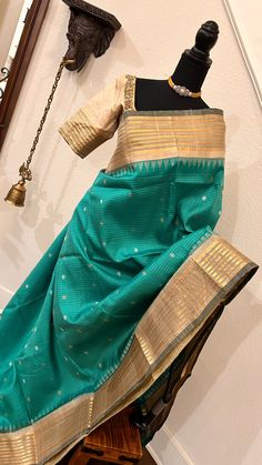 Pure Gadwal silk saree with storched blouse online shopping Comes with prestitched embroidered blouse. Blouse : 36 - 42 size DETAILS AND CARE Color: Teal greenWeight : 600 - 800 gramsLength : 5.5 m saree + 0.7 m blouse Width : 48 InchesFabric : Pure Gadwal silk Craft Description : gAdwal Wash Care : Dry Wash OnlyShipping Time : 5 - 7 Working daysWe Ship Worldwide SHIPPING AND RETURNS Shipping Policy :Shipping days as mentioned above, subject to changes based on the government regulations around the prevailing pandemic situation.Return Policy : We have a comprehensive returns policy , kindly refer to our policy section to know more . DISCLAIMER Color :There can be a slight variance in the colors of the products on our site from the actual ones. This is attributed to the reproduction of colo Red Velvet Blouse, Indian Wedding Sarees, Readymade Blouses Online, Wedding Sarees Online, Wedding Sarees, Wedding Saree Indian, Velvet Blouses, Readymade Blouse, Silk Sarees Online