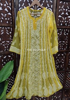 Description Material : Georgette Wash Care : Hand Washable Kurti Length : 44-46 Inches Sleeves : 3/4 Sleeves Package Contains : 1x Kurti With Inner Chikan Kurta, Chikankari Anarkali, Georgette Anarkali, Ethical Clothing Brands, Lucknowi Chikankari, Anarkali Kurti, White Kurta, Anarkali Kurta, Sleeve Packaging