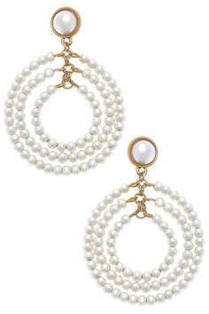 Make a statement on your Big Day with these stunningly sophisticated Ivy Pearl Drop Hoop Earrings in Ivory! Perfect for the modern bride, these elegant earrings will be an unforgettable addition to your look – just like the love of your life! Have all eyes on you for the best reasons. DETAILS: Base Metal with Worn Gold Plating Glass Pearls Post Back Closure 2.625" Length x 1.5" Width Chic Cream Jewelry For Formal Occasions, Chic Cream Jewelry For Formal Events, Chic Cream Formal Jewelry, Chic Pearl Drop Clip-on Earrings For Wedding, Elegant Hoop Chandelier Earrings, Elegant White Clip-on Bridal Earrings, Elegant Hoop Clip-on Earrings, Chic White Round Hoop Earrings, Chic White Hoop Earrings