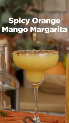 the spicy orange mango margarita is ready to be served