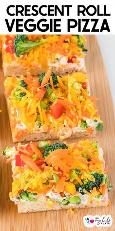 three slices of vegetable pizza on a cutting board