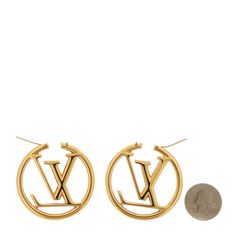 These are a fabulous pair of LOUIS VUITTON Louise Hoop Earrings in Gold . These distinctive hoop earrings feature LV logos inside the circle in a gold finish. Louis Vuitton Jewelry, Hoop Earrings Gold, Earrings In Gold, The Circle, Authentic Louis Vuitton, Earrings Gold, Gold Finish, Gold Earrings, Dust Bag