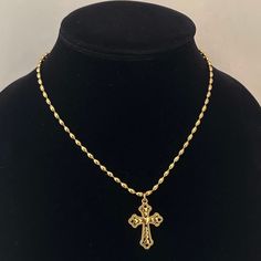 "The Heart Cross Necklace 🤍 Featuring a unique gold cross with heart details and an 18k gold plated stainless steel oval ball chain. shower proof!  Unisex & tarnish proof- 16\" 🖤 each will come with an extender for adjustability.  Made with love 🫶" Big Gold Cross Necklace, Gold Metal Cross Necklace With Adjustable Chain, Gold Chain Cross Necklace As A Gift, Gold Cross Figaro Chain Necklace, Gold Figaro Chain Cross Necklace, Gold Figaro Chain Necklace With Cross Pendant, Gold Figaro Chain Necklace With Cross Shape, Gold Cross Necklace With Chain As Gift, Gold Cross Chain Necklace With Adjustable Chain