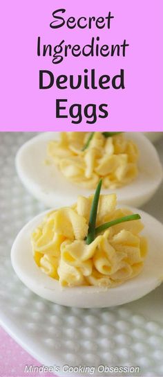 three deviled eggs on a white plate with the words secret ingredient for deviled eggs