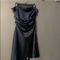 Fancy Navy Blue Dress, Never Worn, Very Short, Strapless, Strappy In Back Blue Strapless Dress With Ruched Bodice For Cocktail, Blue Strapless Dress With Ruched Bodice For Evening, Blue Satin Strapless Cocktail Dress, Elegant Blue Mini Dress With Ruched Bodice, Elegant Fitted Blue Strapless Dress, Blue Dressy Mini Dress For Evening, Blue Satin Strapless Evening Dress, Blue Strapless Mini Dress For Evening, Formal Blue Satin Strapless Dress