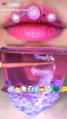 a woman's lips are covered in pink liquid and colorful candies on the bottom